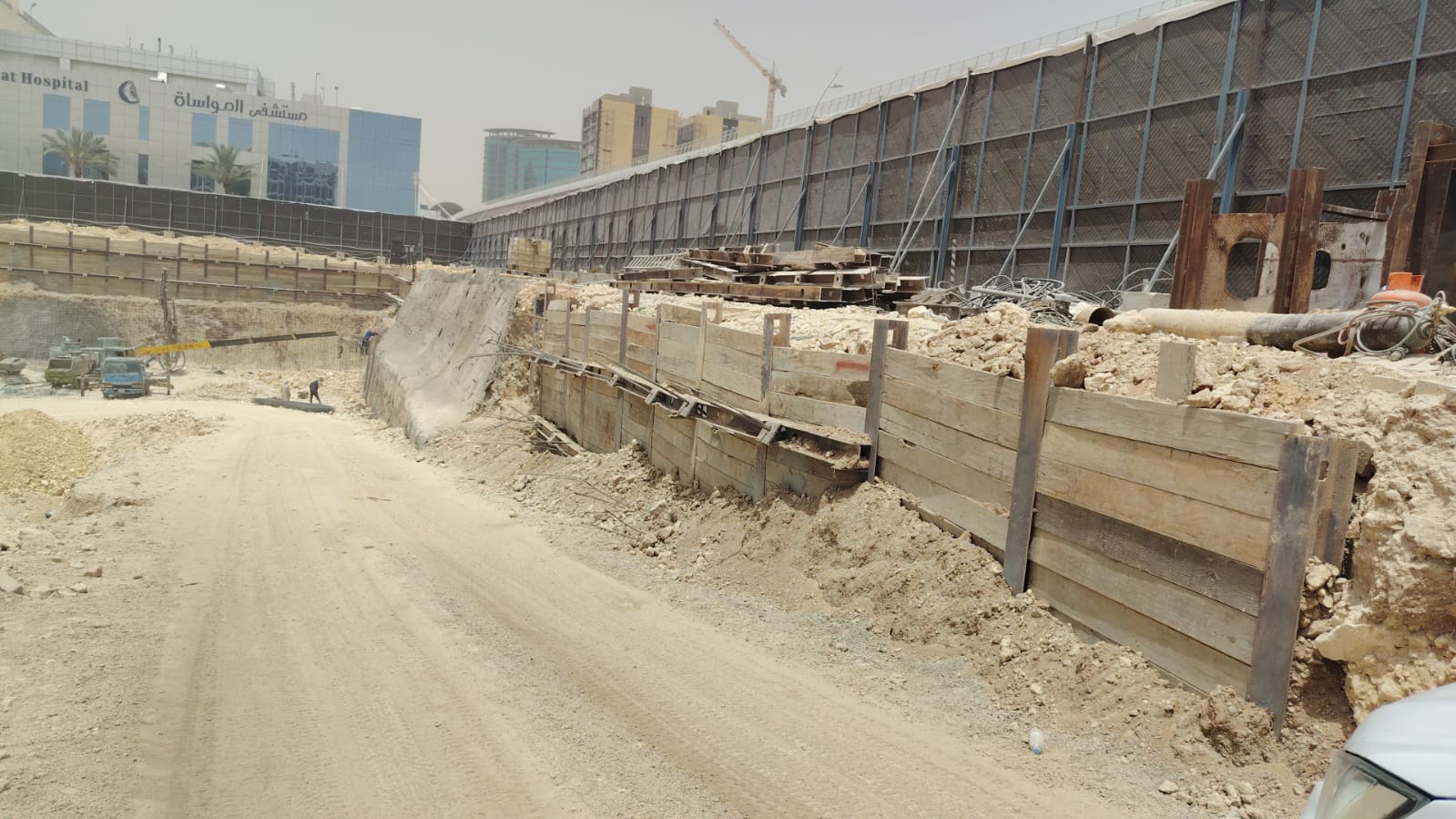 Excavation and earth retention work at a site